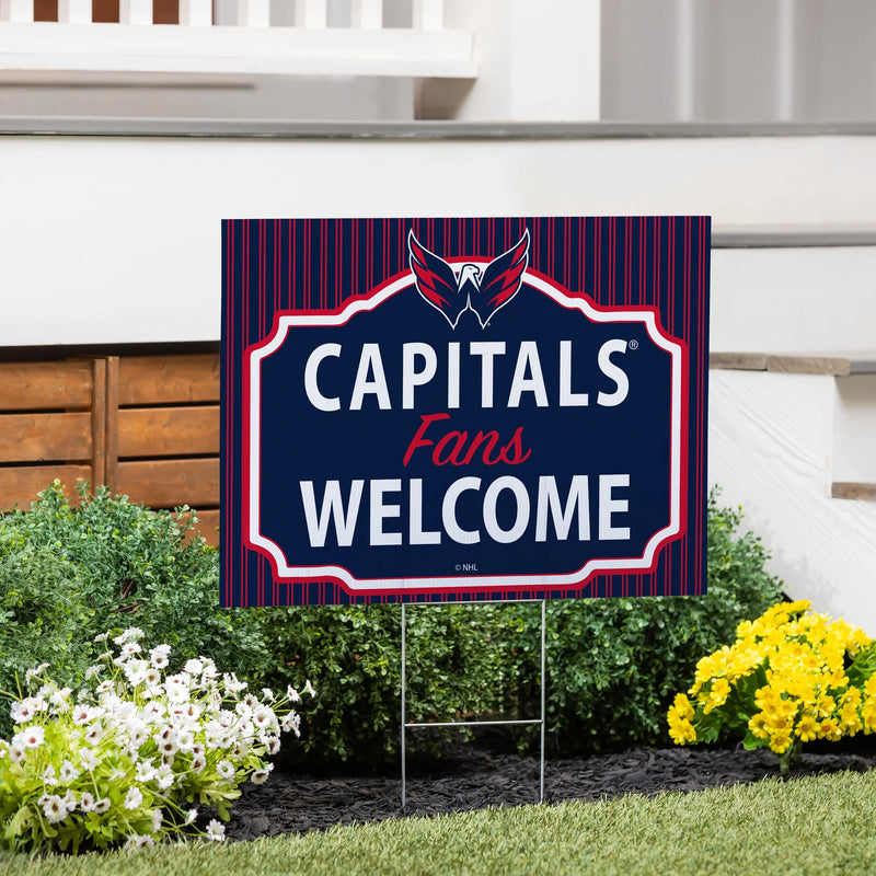Garden sign with 'Capitals Fans Welcome' text and logo in a decorative frame.
